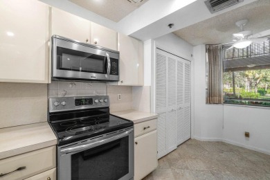 Welcome to this beautifully maintained first-floor corner condo on The Country Club At Boca Raton in Florida - for sale on GolfHomes.com, golf home, golf lot
