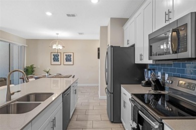 Unlock your Central Florida dream at 860 Pebble Beach Drive on The Oasis Club at Champions Gate in Florida - for sale on GolfHomes.com, golf home, golf lot