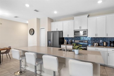 Unlock your Central Florida dream at 860 Pebble Beach Drive on The Oasis Club at Champions Gate in Florida - for sale on GolfHomes.com, golf home, golf lot