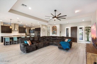 This stunning 5-bedroom, 4-bathroom home is a true gem, offering on Estrella Mountain Ranch Golf Course in Arizona - for sale on GolfHomes.com, golf home, golf lot