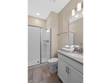 Unlock your Central Florida dream at 860 Pebble Beach Drive on The Oasis Club at Champions Gate in Florida - for sale on GolfHomes.com, golf home, golf lot