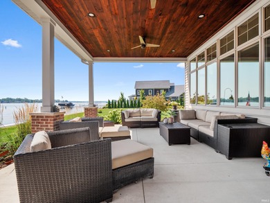 Experience refined waterfront living on Lake Wawasee in this on Wawasee Golf Club in Indiana - for sale on GolfHomes.com, golf home, golf lot