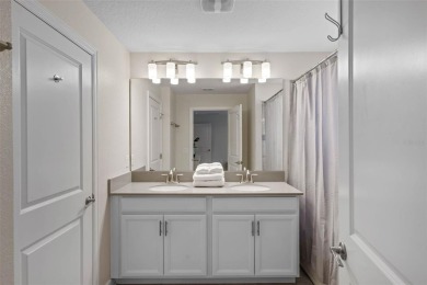 Unlock your Central Florida dream at 860 Pebble Beach Drive on The Oasis Club at Champions Gate in Florida - for sale on GolfHomes.com, golf home, golf lot