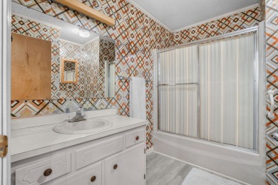 Located directly on the golf course of the Eastern Shore Yacht on Eastern Shore Yacht and Country Club in Virginia - for sale on GolfHomes.com, golf home, golf lot