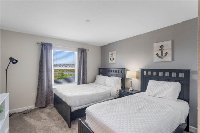 Unlock your Central Florida dream at 860 Pebble Beach Drive on The Oasis Club at Champions Gate in Florida - for sale on GolfHomes.com, golf home, golf lot