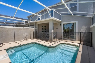 Unlock your Central Florida dream at 860 Pebble Beach Drive on The Oasis Club at Champions Gate in Florida - for sale on GolfHomes.com, golf home, golf lot