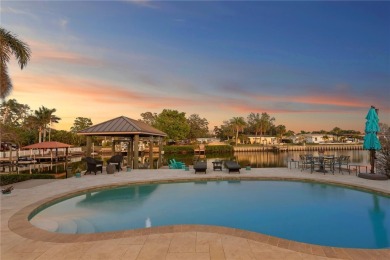 Experience the pinnacle of waterfront living in Dana Shores on Rocky Point Golf Course in Florida - for sale on GolfHomes.com, golf home, golf lot