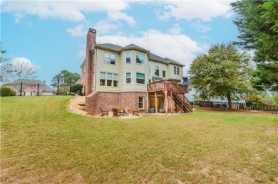 STUNNING 3 SIDES BRICK EXECUTIVE HOME LOCATED IN THE HIGHLY on Hamilton Mill Golf Club in Georgia - for sale on GolfHomes.com, golf home, golf lot