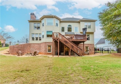 STUNNING 3 SIDES BRICK EXECUTIVE HOME LOCATED IN THE HIGHLY on Hamilton Mill Golf Club in Georgia - for sale on GolfHomes.com, golf home, golf lot