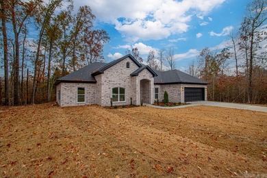 Step inside this beautiful new 4 bed, 2.5 bath home and fall in on Silver Springs Country Club in Arkansas - for sale on GolfHomes.com, golf home, golf lot