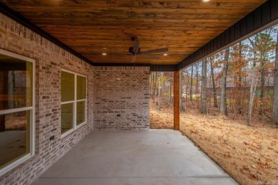 Step inside this beautiful new 4 bed, 2.5 bath home and fall in on Silver Springs Country Club in Arkansas - for sale on GolfHomes.com, golf home, golf lot