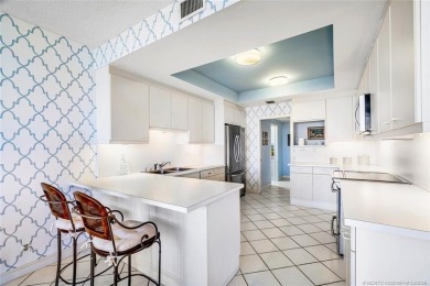 This stunning condominium offers breathtaking panoramic views of on Sailfish Point Golf Club, Inc. in Florida - for sale on GolfHomes.com, golf home, golf lot