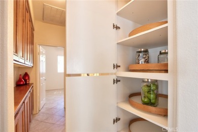 Welcome to this immaculate, single-story 2-bedroom, 2-bath + on Menifee Lakes Country Club - Lakes in California - for sale on GolfHomes.com, golf home, golf lot