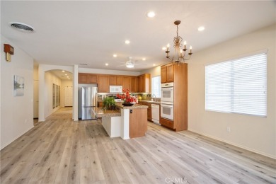 Welcome to this immaculate, single-story 2-bedroom, 2-bath + on Menifee Lakes Country Club - Lakes in California - for sale on GolfHomes.com, golf home, golf lot