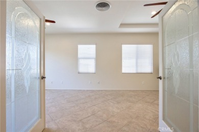 Welcome to this immaculate, single-story 2-bedroom, 2-bath + on Menifee Lakes Country Club - Lakes in California - for sale on GolfHomes.com, golf home, golf lot