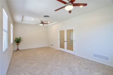Welcome to this immaculate, single-story 2-bedroom, 2-bath + on Menifee Lakes Country Club - Lakes in California - for sale on GolfHomes.com, golf home, golf lot