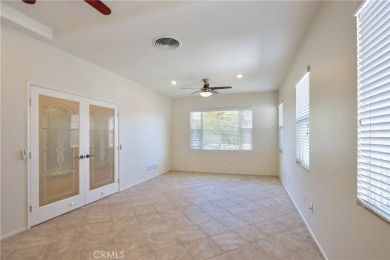 Welcome to this immaculate, single-story 2-bedroom, 2-bath + on Menifee Lakes Country Club - Lakes in California - for sale on GolfHomes.com, golf home, golf lot