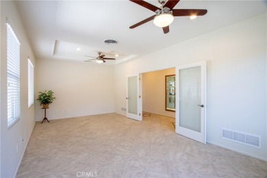 Welcome to this immaculate, single-story 2-bedroom, 2-bath + on Menifee Lakes Country Club - Lakes in California - for sale on GolfHomes.com, golf home, golf lot