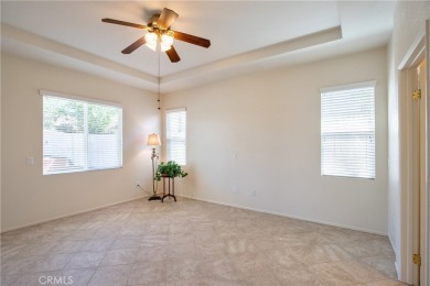 Welcome to this immaculate, single-story 2-bedroom, 2-bath + on Menifee Lakes Country Club - Lakes in California - for sale on GolfHomes.com, golf home, golf lot