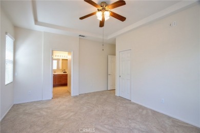 Welcome to this immaculate, single-story 2-bedroom, 2-bath + on Menifee Lakes Country Club - Lakes in California - for sale on GolfHomes.com, golf home, golf lot