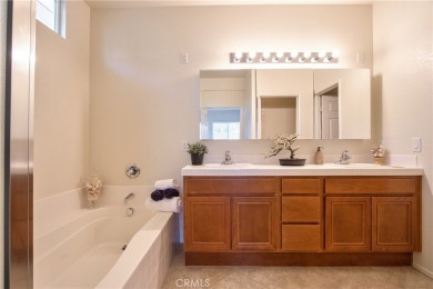 Welcome to this immaculate, single-story 2-bedroom, 2-bath + on Menifee Lakes Country Club - Lakes in California - for sale on GolfHomes.com, golf home, golf lot