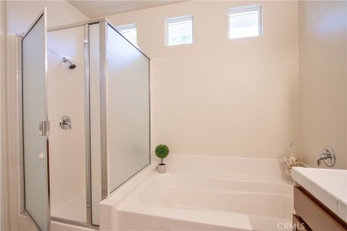 Welcome to this immaculate, single-story 2-bedroom, 2-bath + on Menifee Lakes Country Club - Lakes in California - for sale on GolfHomes.com, golf home, golf lot