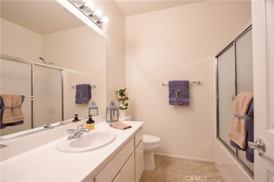 Welcome to this immaculate, single-story 2-bedroom, 2-bath + on Menifee Lakes Country Club - Lakes in California - for sale on GolfHomes.com, golf home, golf lot