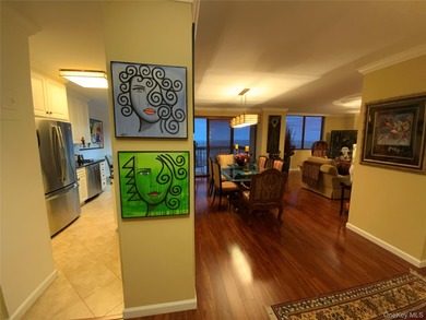 Long, wide and dramatic living room, formal dining room, gourmet on Towers Country Club in New York - for sale on GolfHomes.com, golf home, golf lot