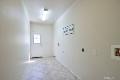 Welcome to this immaculate, single-story 2-bedroom, 2-bath + on Menifee Lakes Country Club - Lakes in California - for sale on GolfHomes.com, golf home, golf lot
