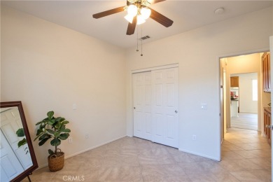 Welcome to this immaculate, single-story 2-bedroom, 2-bath + on Menifee Lakes Country Club - Lakes in California - for sale on GolfHomes.com, golf home, golf lot