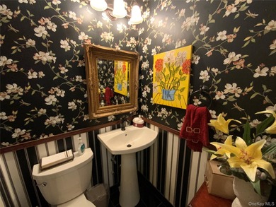 Long, wide and dramatic living room, formal dining room, gourmet on Towers Country Club in New York - for sale on GolfHomes.com, golf home, golf lot