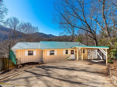 Positioned above Maggie Valley Club & Resort, this 2 bedroom, 2 on Maggie Valley Resort and Country Club in North Carolina - for sale on GolfHomes.com, golf home, golf lot