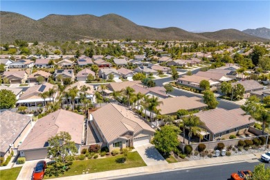 Welcome to this immaculate, single-story 2-bedroom, 2-bath + on Menifee Lakes Country Club - Lakes in California - for sale on GolfHomes.com, golf home, golf lot