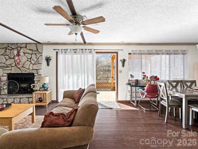 Positioned above Maggie Valley Club & Resort, this 2 bedroom, 2 on Maggie Valley Resort and Country Club in North Carolina - for sale on GolfHomes.com, golf home, golf lot