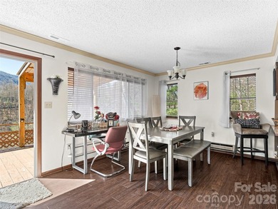 Positioned above Maggie Valley Club & Resort, this 2 bedroom, 2 on Maggie Valley Resort and Country Club in North Carolina - for sale on GolfHomes.com, golf home, golf lot