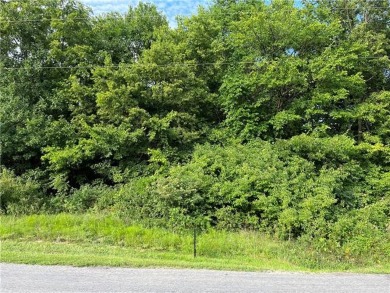 Wonderful partially wooded first-tier level building lot at on Linn Valley Lakes - Deer Trace Golf Course in Kansas - for sale on GolfHomes.com, golf home, golf lot