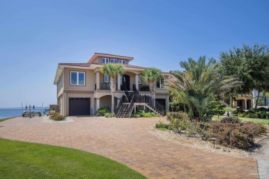 This stunning ICF waterfront home, featuring 135 feet on the on Tiger Point Golf and Country Club in Florida - for sale on GolfHomes.com, golf home, golf lot