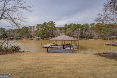 Welcome to this beautifully renovated lakefront home in Turtle on Turtle Cove Golf Course in Georgia - for sale on GolfHomes.com, golf home, golf lot