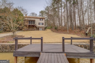 Welcome to this beautifully renovated lakefront home in Turtle on Turtle Cove Golf Course in Georgia - for sale on GolfHomes.com, golf home, golf lot