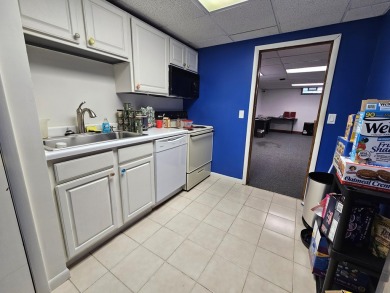 Unlock the potential of this commercial property, perfectly on Riverside Country Club in Michigan - for sale on GolfHomes.com, golf home, golf lot