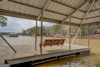 Welcome to this beautifully renovated lakefront home in Turtle on Turtle Cove Golf Course in Georgia - for sale on GolfHomes.com, golf home, golf lot