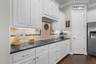 Privacy of gated community and golf course views are just two on The Lake Country Club - Lake Waco in Texas - for sale on GolfHomes.com, golf home, golf lot
