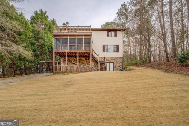 Welcome to this beautifully renovated lakefront home in Turtle on Turtle Cove Golf Course in Georgia - for sale on GolfHomes.com, golf home, golf lot