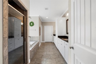 Privacy of gated community and golf course views are just two on The Lake Country Club - Lake Waco in Texas - for sale on GolfHomes.com, golf home, golf lot