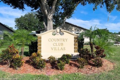 Move in ready Villa.  Open Living, kitchen, dining area with on Spring Lake Golf Resort in Florida - for sale on GolfHomes.com, golf home, golf lot
