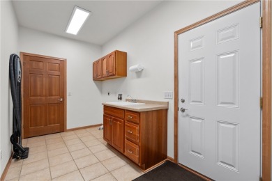 Enjoy scenic views of Mill Run Golf Course from this bright and on Mill Run Golf Course in Wisconsin - for sale on GolfHomes.com, golf home, golf lot