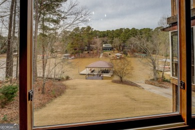 Welcome to this beautifully renovated lakefront home in Turtle on Turtle Cove Golf Course in Georgia - for sale on GolfHomes.com, golf home, golf lot