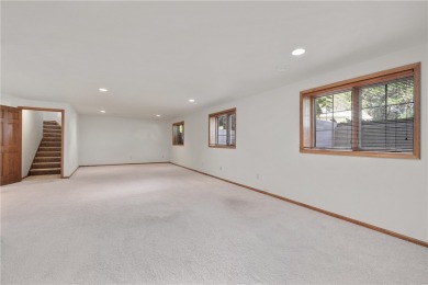 Enjoy scenic views of Mill Run Golf Course from this bright and on Mill Run Golf Course in Wisconsin - for sale on GolfHomes.com, golf home, golf lot