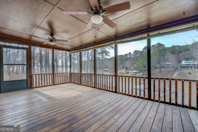 Welcome to this beautifully renovated lakefront home in Turtle on Turtle Cove Golf Course in Georgia - for sale on GolfHomes.com, golf home, golf lot