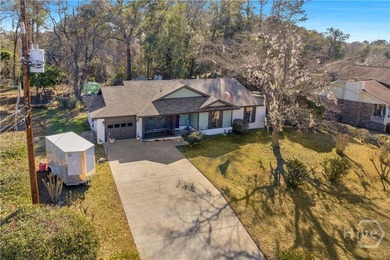 Welcome home to this lovely 4 bedroom, 2 bath ranch with 1,862 on Cherokee Rose Country Club in Georgia - for sale on GolfHomes.com, golf home, golf lot